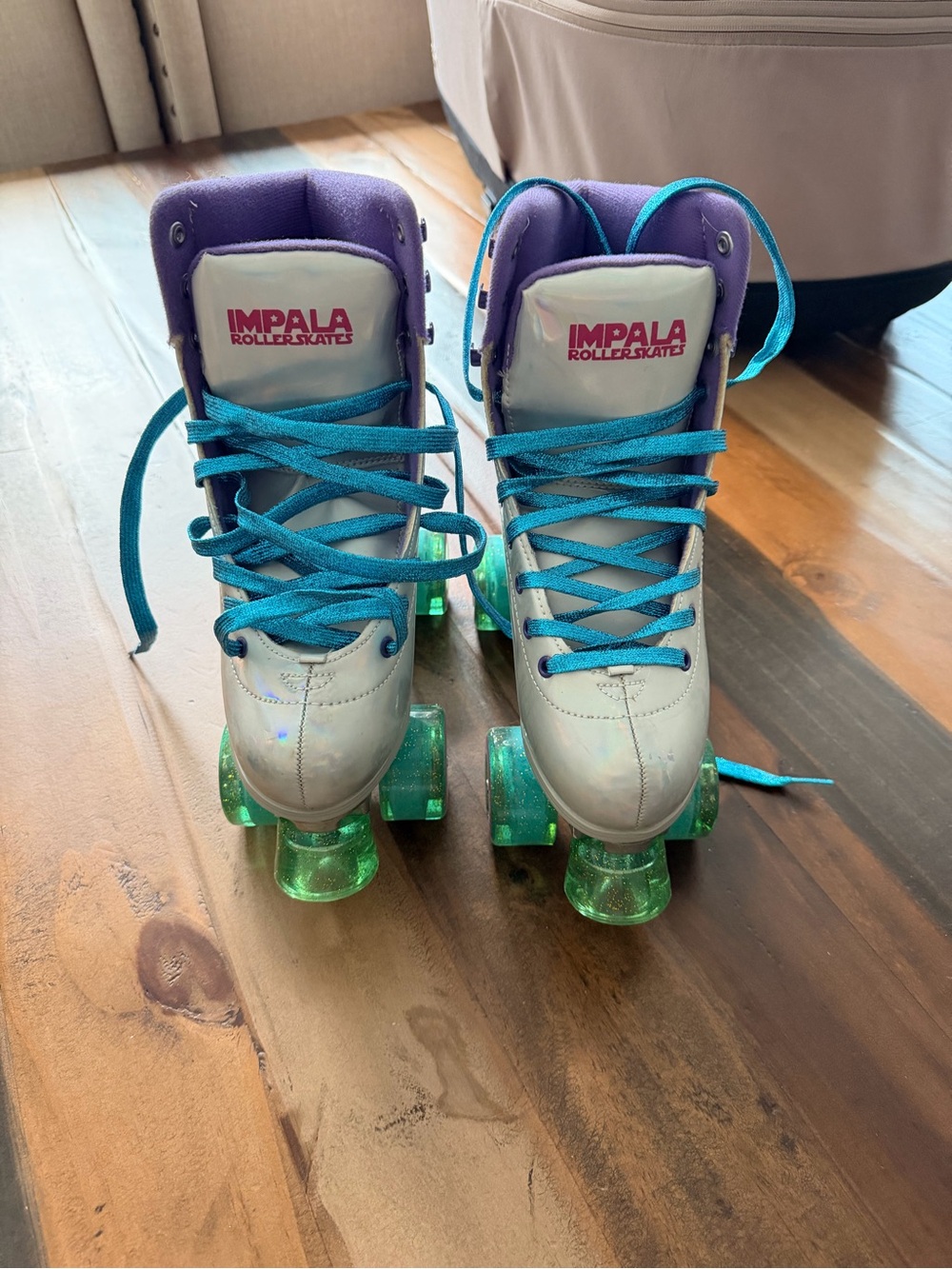 Impala Women's White Roller Skates with Purple Accents and Teal Laces